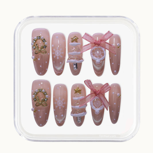 Long Oval Tennail press-ons with Cat Eye finish, 3D snow globes, rhinestones, and painted snowflakes.