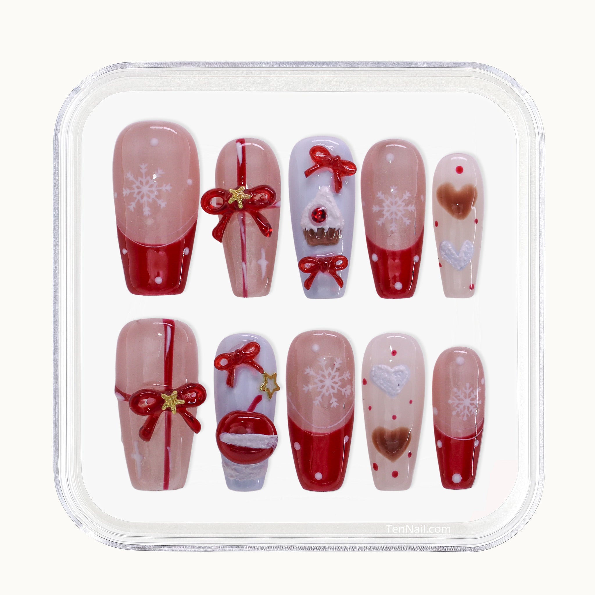 Medium Squoval Tennail press-ons with Christmas French tips, 3D bows, gifts, and snowflakes.