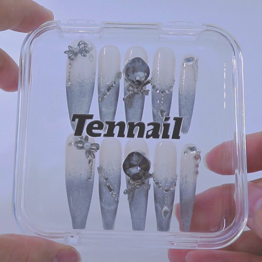 Video showcases TenNail's Medieval Star Nails: intricate star motifs, rich jewel tones, and ornate detailing shimmer as hands move, evoking a mystical medieval ambiance.