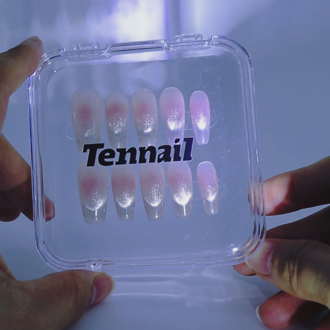 Video of TenNail's Blush Cat Eye Nails: soft pink gradient with cat eye shimmer on medium T - shaped press - ons shimmers as hands move, adding subtle elegance to any look.