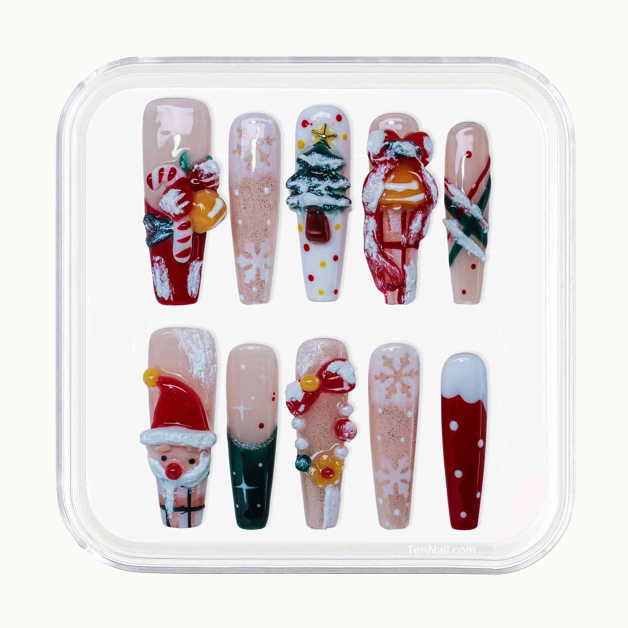 Set of Christmas-themed nail art designs in a clear plastic case. by Tennail press on nails.