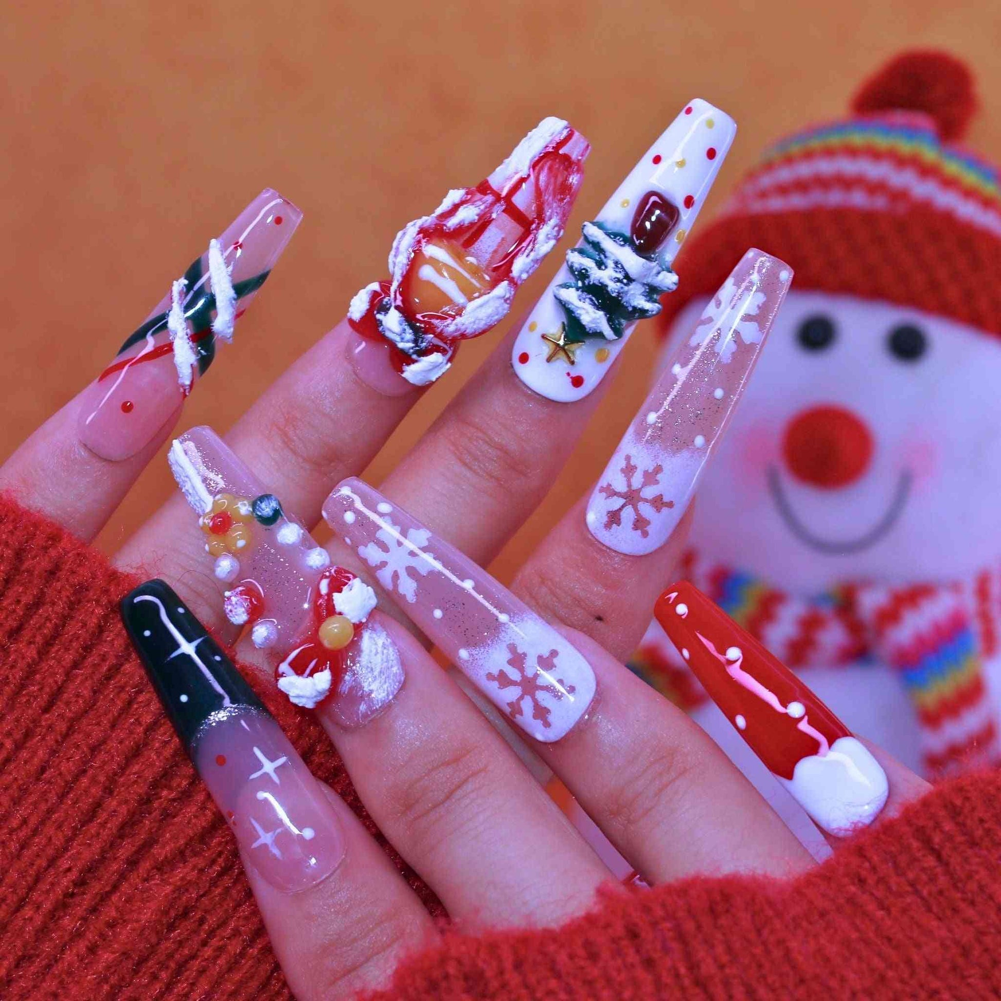Santa's Whimsy Christmas Nails featuring 3D Santa, Christmas tree, candy, snowflake designs—festive press-on nails for holiday cheer, perfect for Christmas looks with easy application and long wear.
