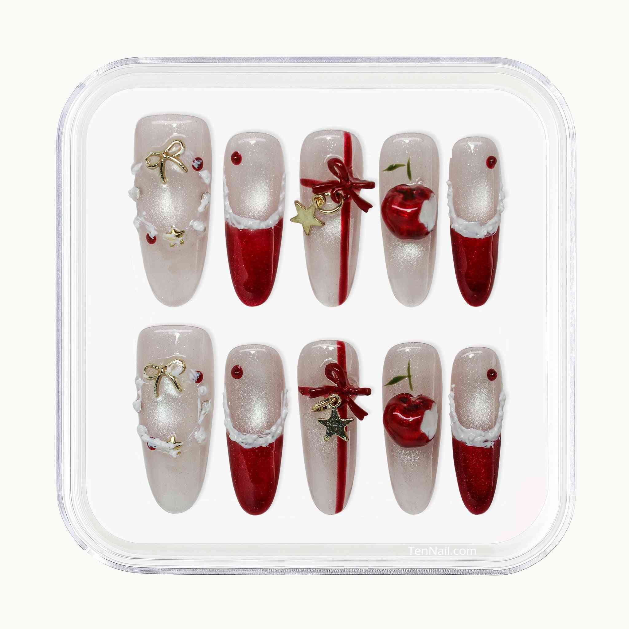 Set of Christmas-themed nail art designs in a clear plastic case.by Tennail press on nails.