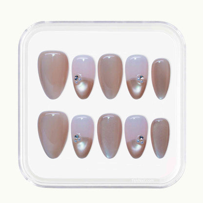 Dewy French Tip Nails with soft nude hues, French tips, rhinestone details—elegant press-on nails for a refined look, easy to apply and long-wearing.