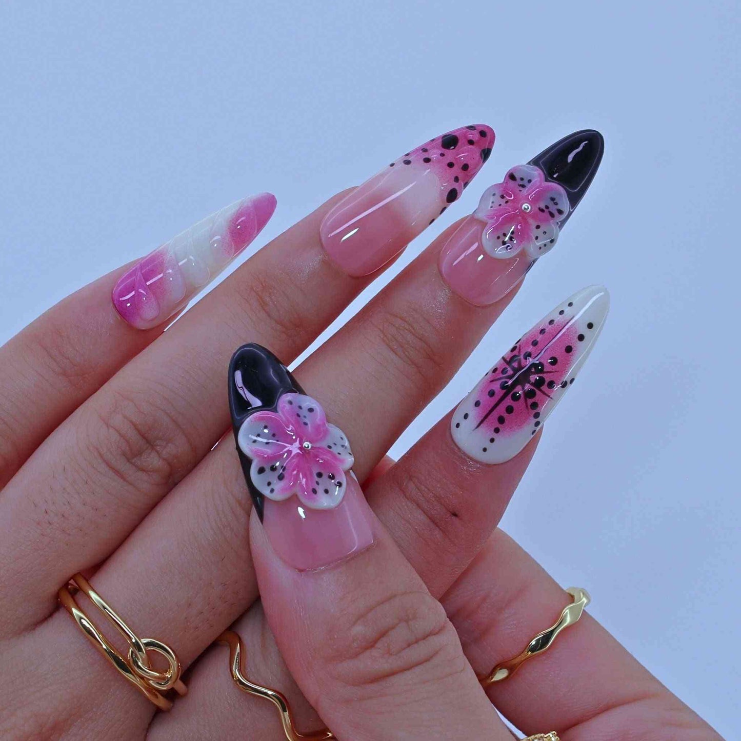 Dotted Blossom Nails with black dots, purple florals, hand-painted art by Tennail