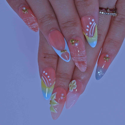 Close-up of hands with colorful nail art  , Coastal Bloom press on Nails with hand-painted florals, starfish accents, coastal hues by Tennial