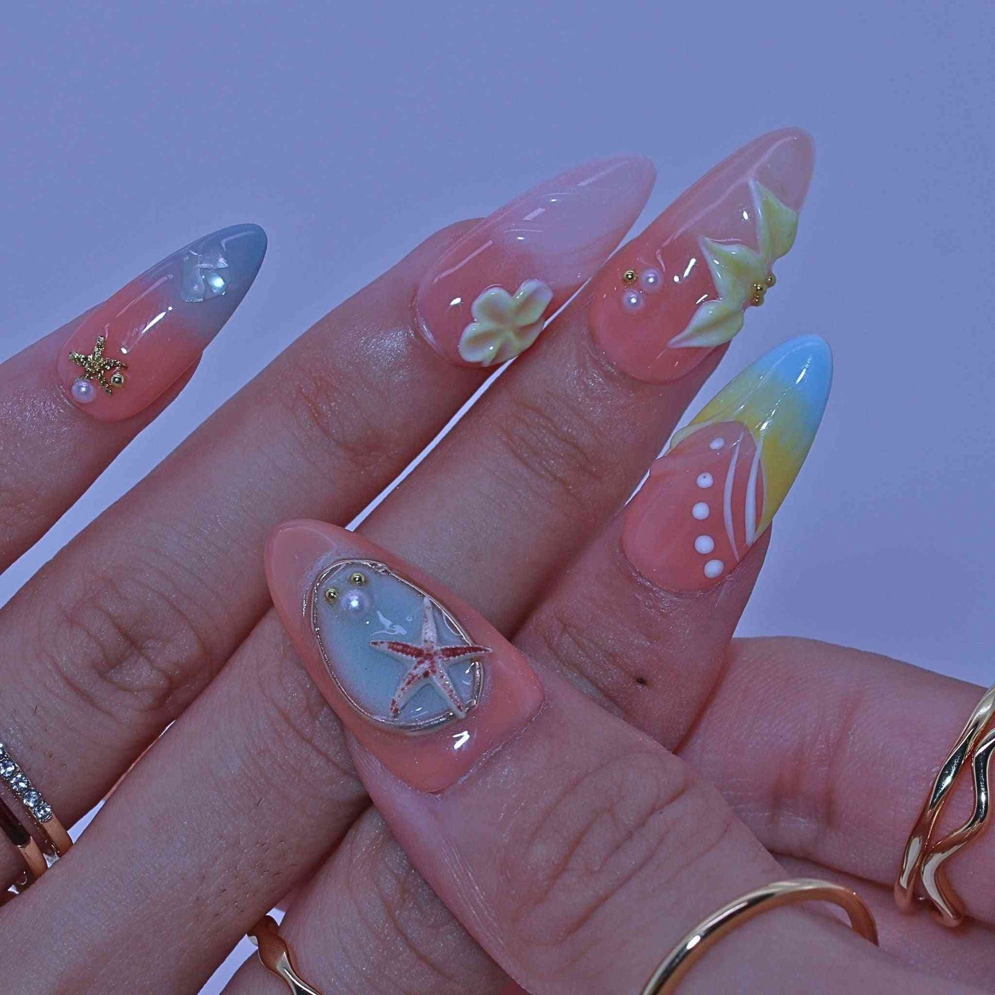Close-up of a hand with colorful nail art , Pastel Floral press on Nails with hand-painted florals, pastel hues, delicate accents by Tennail