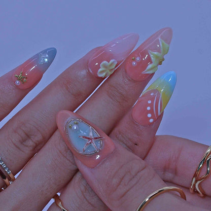 Close-up of a hand with colorful nail art , Pastel Floral press on Nails with hand-painted florals, pastel hues, delicate accents by Tennail
