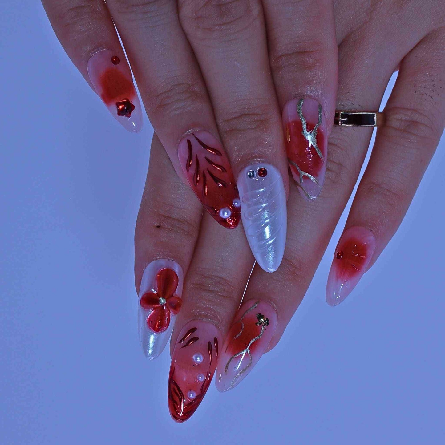 Crimson Bloom press on Nails with hand-painted red florals, gradients, rhinestone accents by Tennail