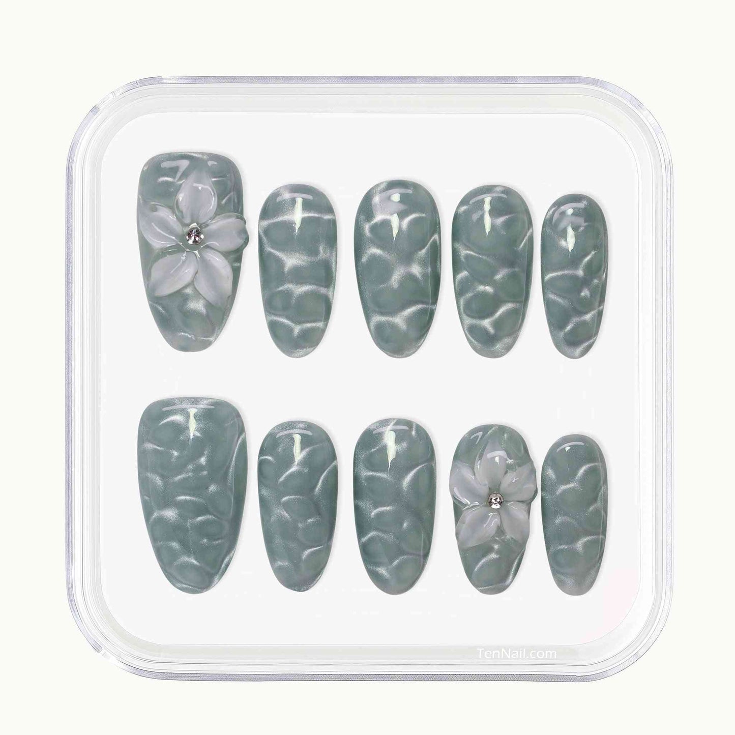 Aqua Wave press on Nails with hand-painted waves, aqua cat-eye, floral accents by Tennail—chic press-on nails for a serene look, easy to apply and long-wearing.