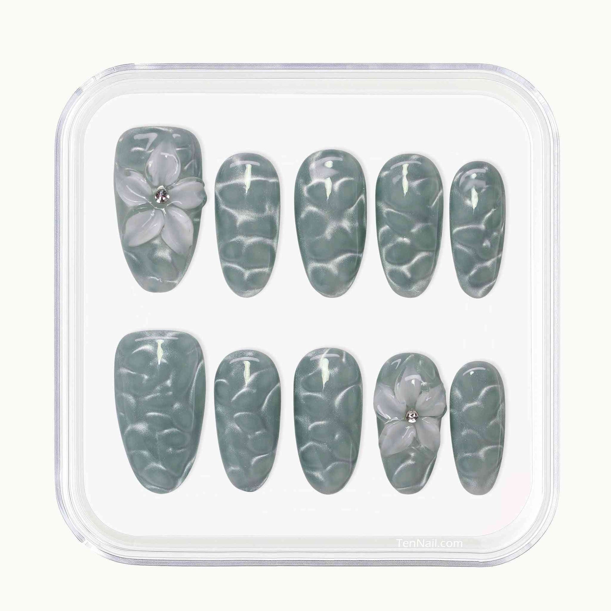 Aqua Wave press on Nails with hand-painted waves, aqua cat-eye, floral accents by Tennail—chic press-on nails for a serene look, easy to apply and long-wearing.