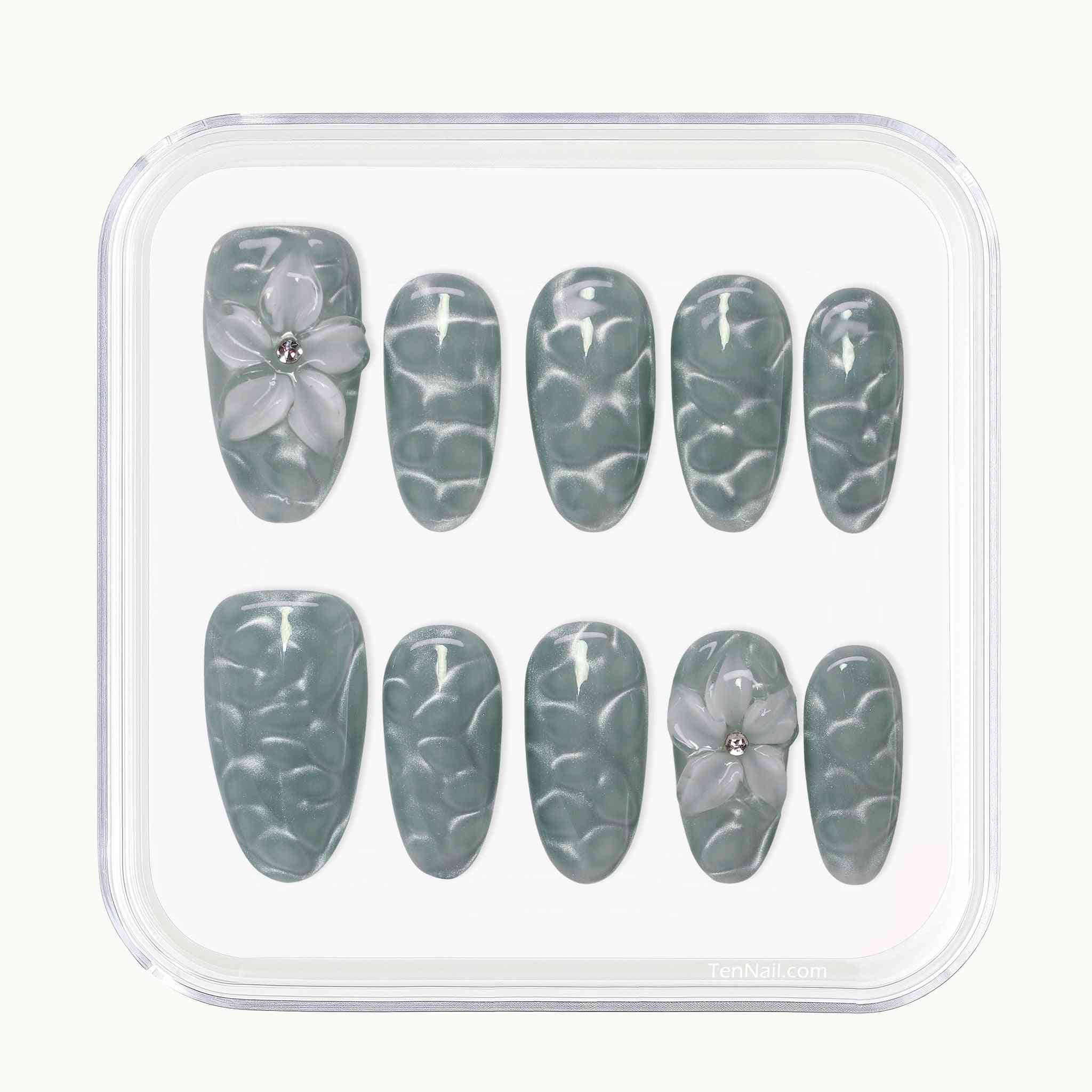 Aqua Wave press on Nails with hand-painted waves, aqua cat-eye, floral accents by Tennail—chic press-on nails for a serene look, easy to apply and long-wearing.