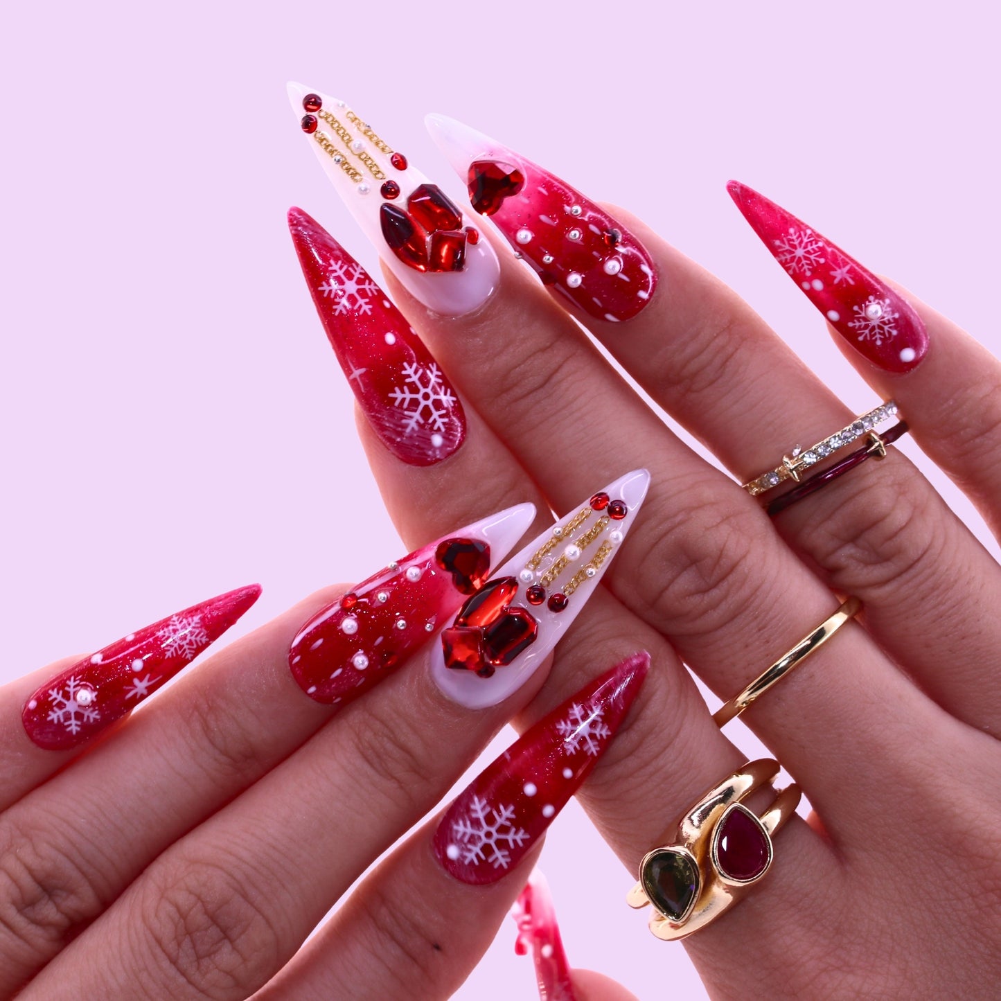 Close-up of hands with red and white nail art , Tennail handmade press on nails.