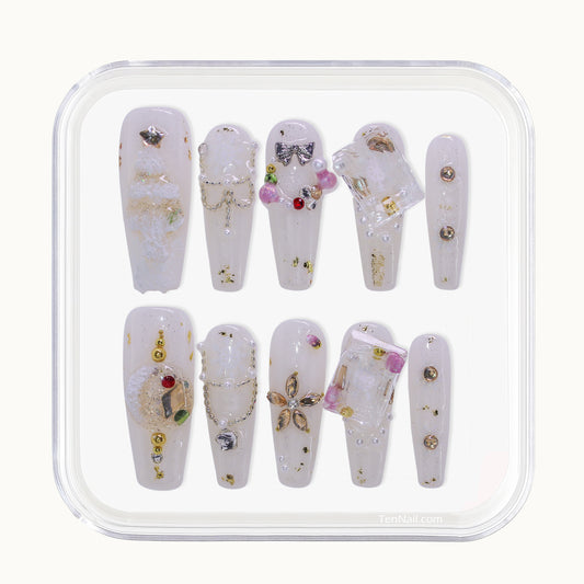 Long Coffin White Christmas press-on nails with 3D snow globes, Christmas trees, rhinestones, and pearls.