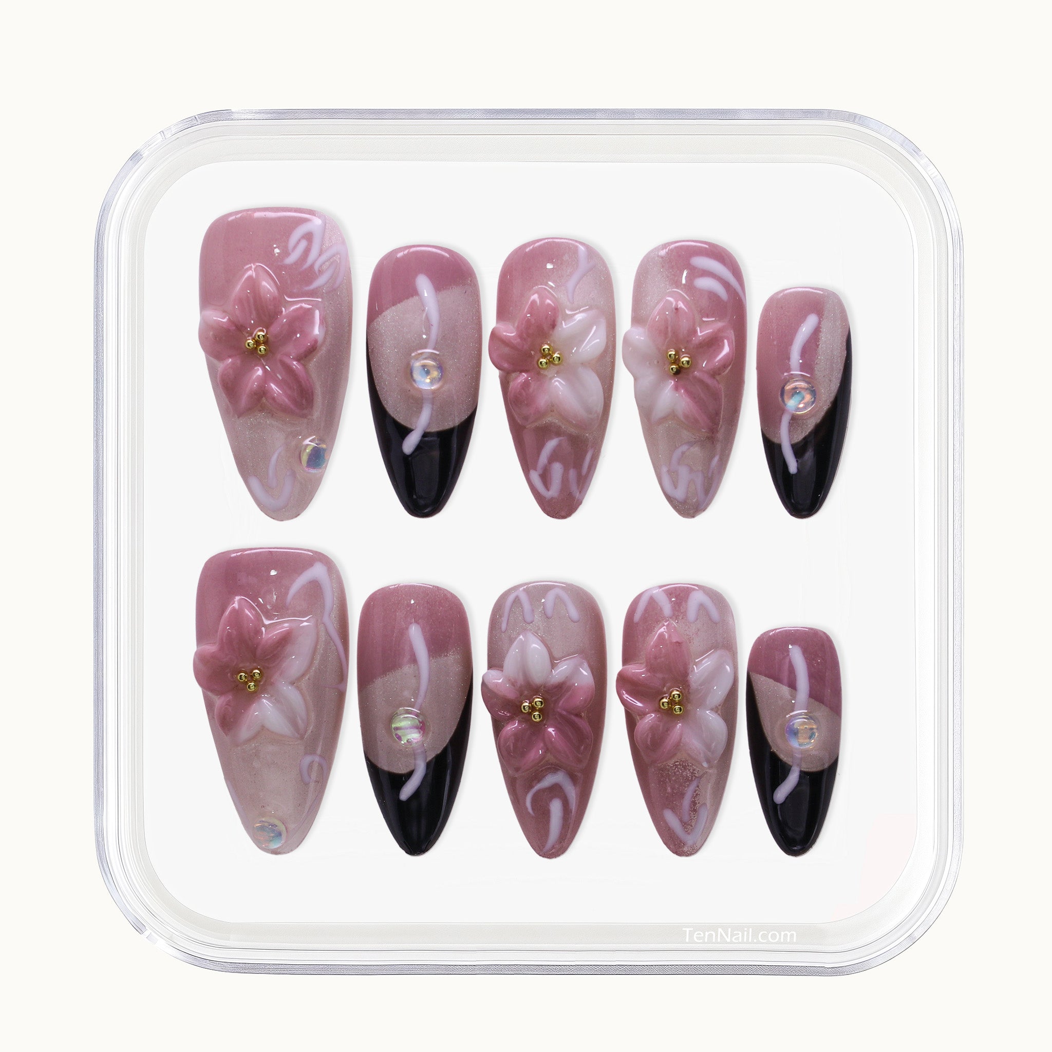 Medium Almond Tennail press-ons with pink Ombré, Cat Eye finish, and 3D floral accents.