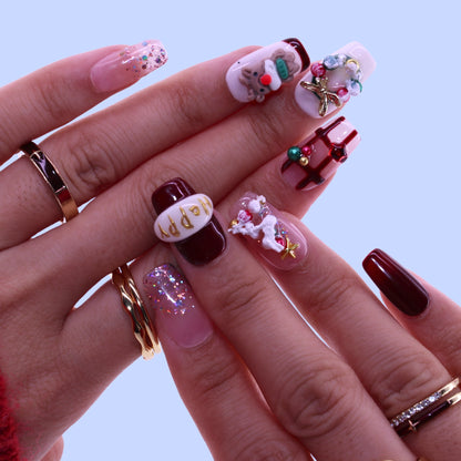 Close-up of a hand with intricately designed nails, Tennail handmade press on nails.