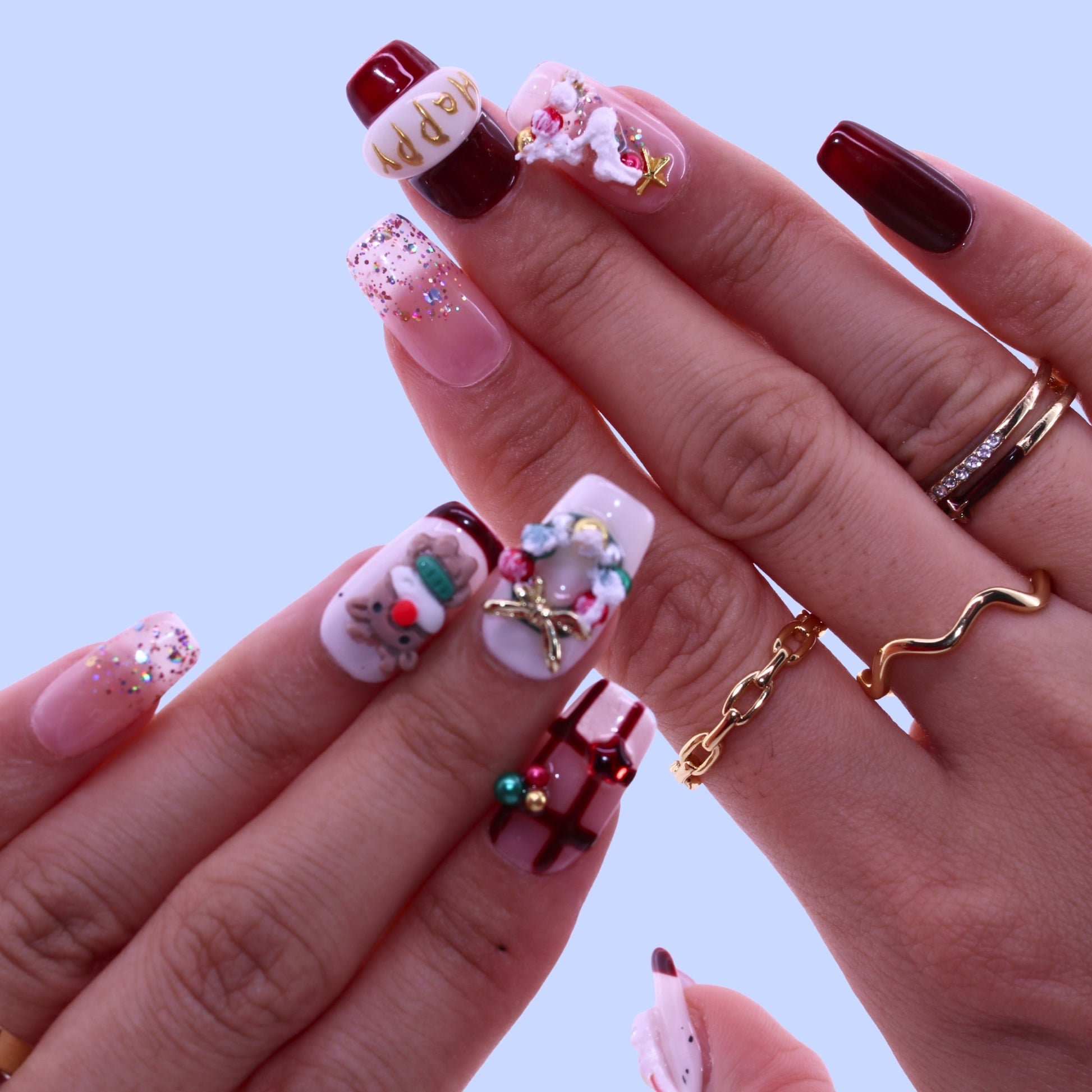 Close-up of hands with intricately designed nails, Tennail handmade press on nails.