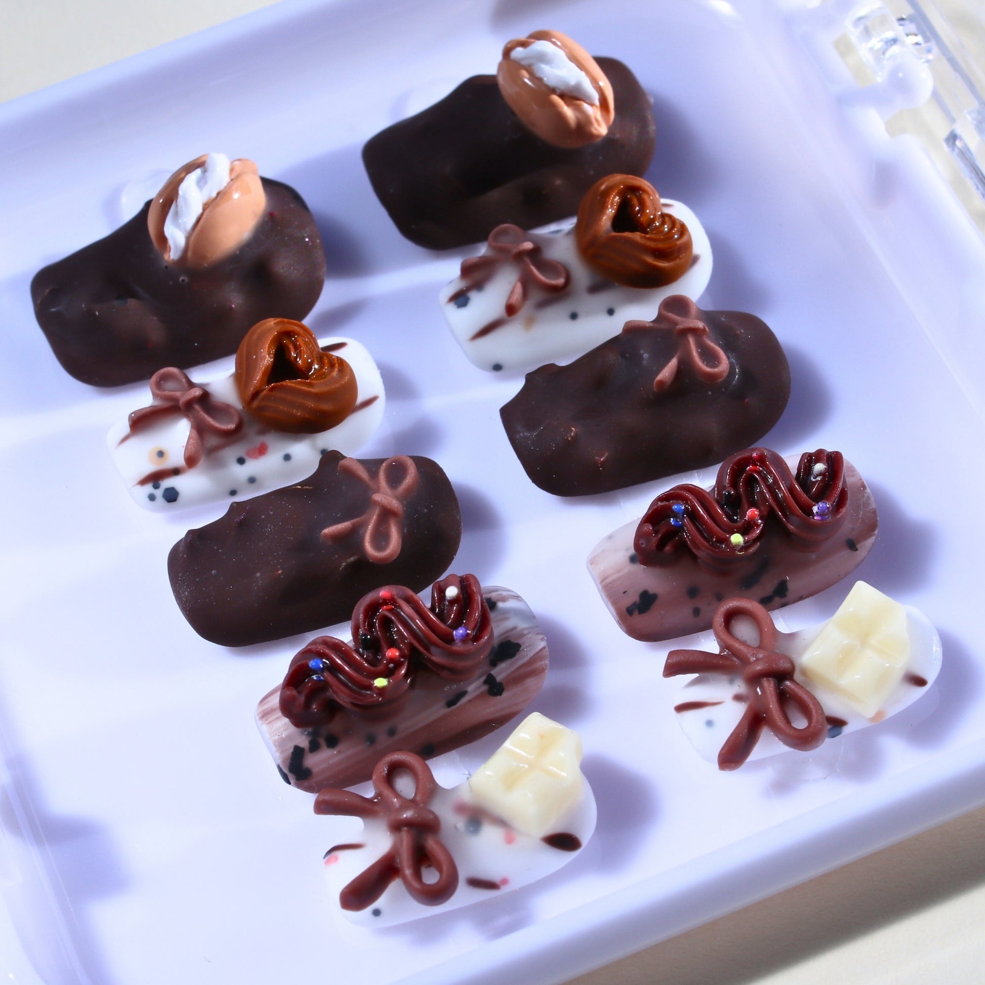 Medium Square Tennail press-ons in chocolate colors with 3D dessert charms and matte texture.